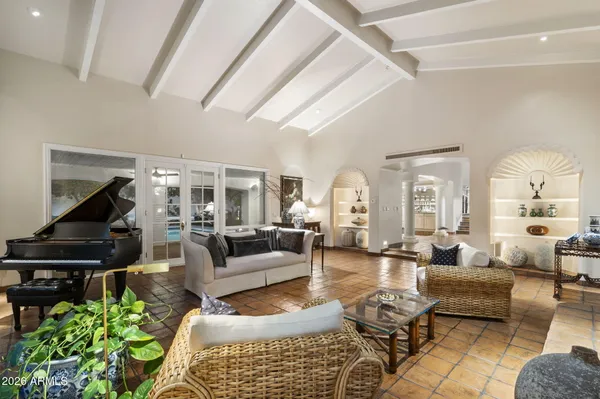 a view of a dining room with furniture window and outside view