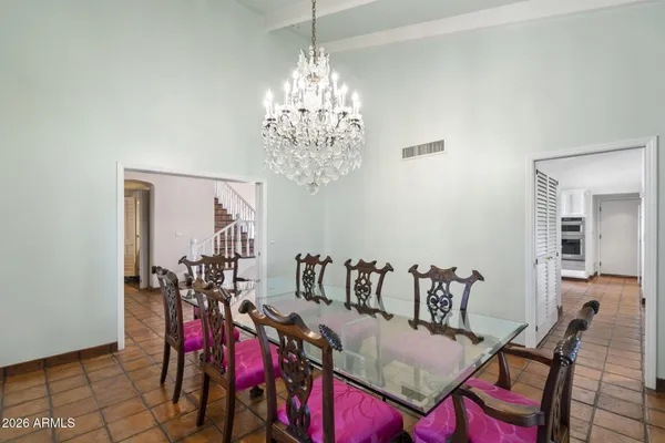 a kitchen with a stove and a refrigerator