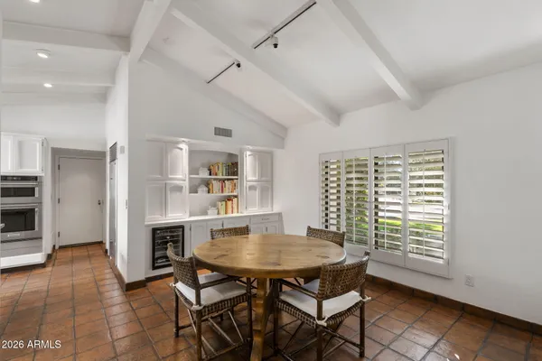 a bathroom with a sink and vanity