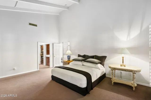 a room with a window and sitting area