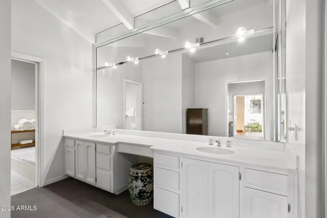 a living room with furniture a dining table and chairs