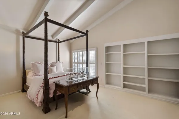 a kitchen with a stove sink and cabinets