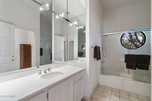 a view of a swimming pool with lounge chair