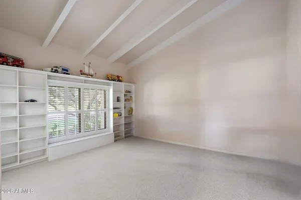 a front view of a house with swimming pool yard and outdoor seating