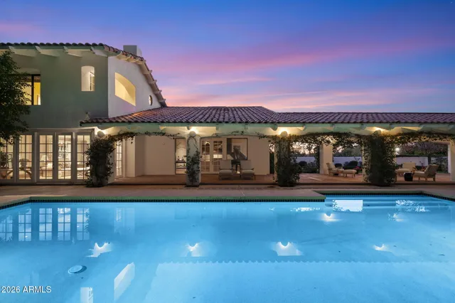 a living room with furniture or couch and a fireplace