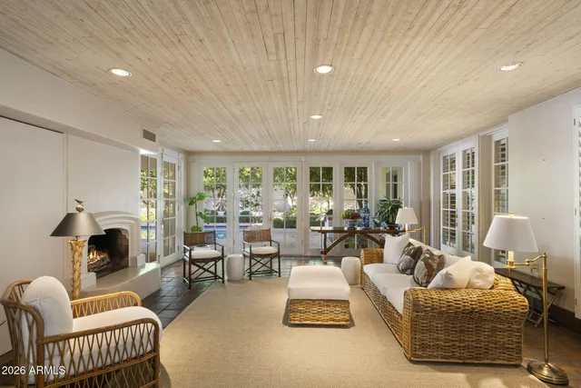 a living room with furniture and a table