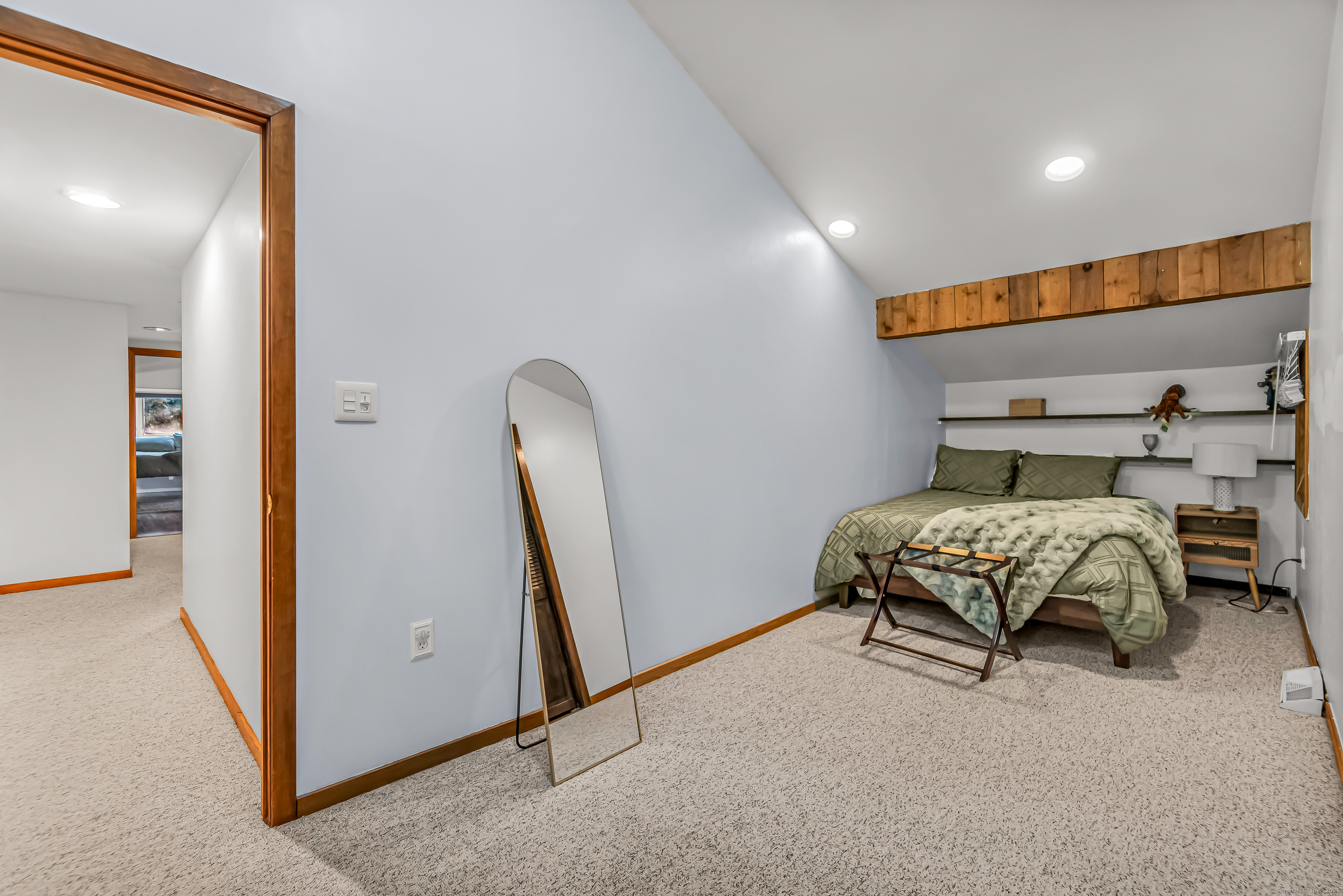 4 Old Gate Lane Newtown, CT 06470 - Photo 17 of 37 a bedroom with a bed and a mirror