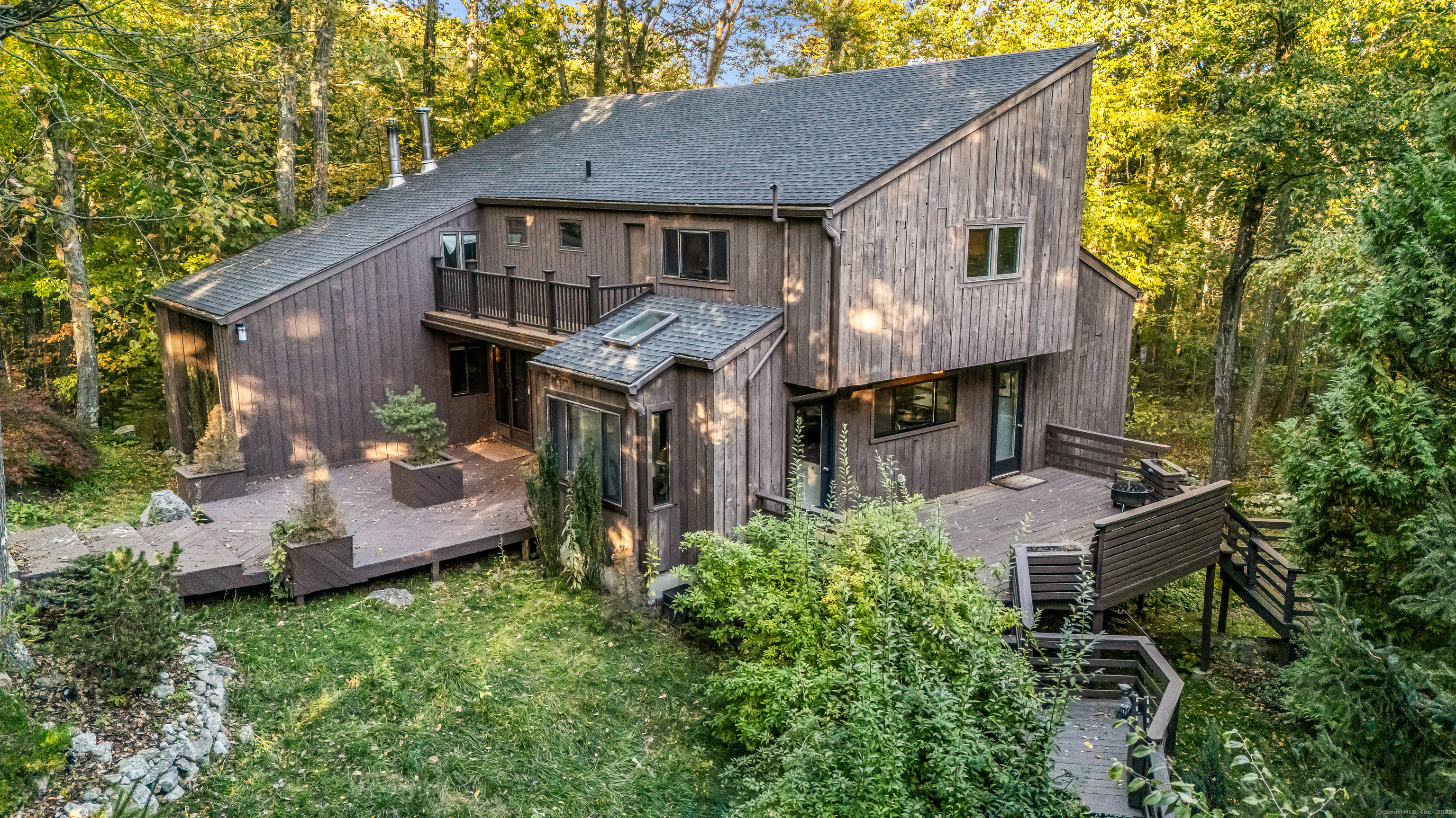 4 Old Gate Lane Newtown, CT 06470 - Photo 29 of 37 aerial view of a house with a yard balcony and furniture