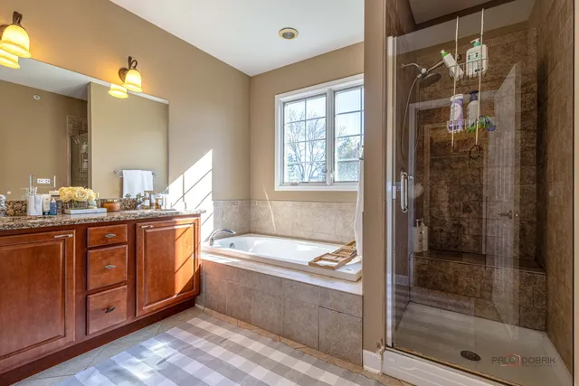 a bathroom with a bathtub and a sink