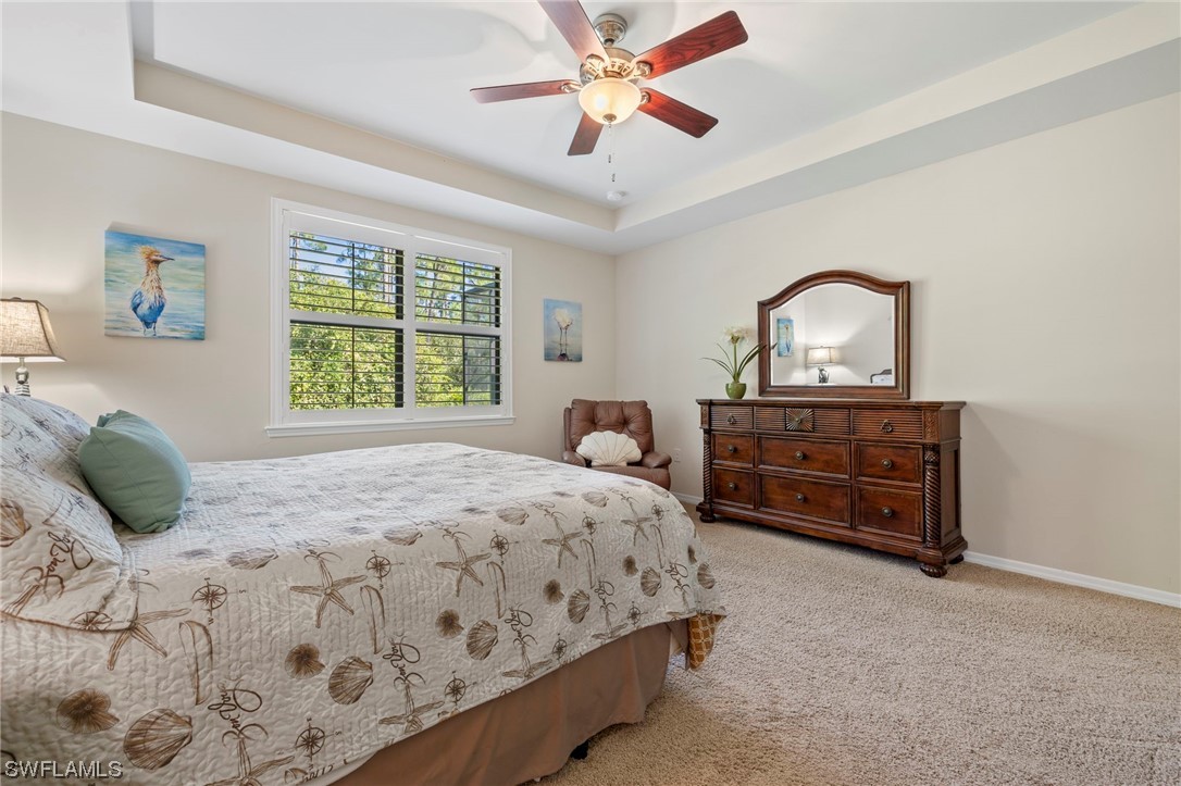 10844 Dennington Road Fort Myers, FL 33913 - Photo 11 of 50 a bedroom with a bed and a dresser