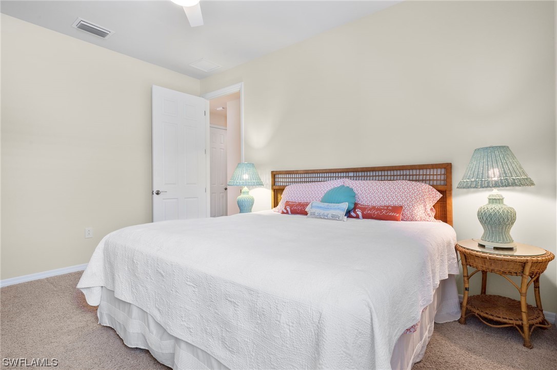 10844 Dennington Road Fort Myers, FL 33913 - Photo 18 of 50 a bedroom with a bed and window