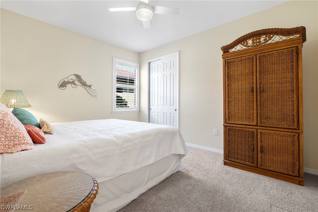10844 Dennington Road Fort Myers, FL 33913 - Photo 19 of 50 a bedroom with a bed and a walk in closet