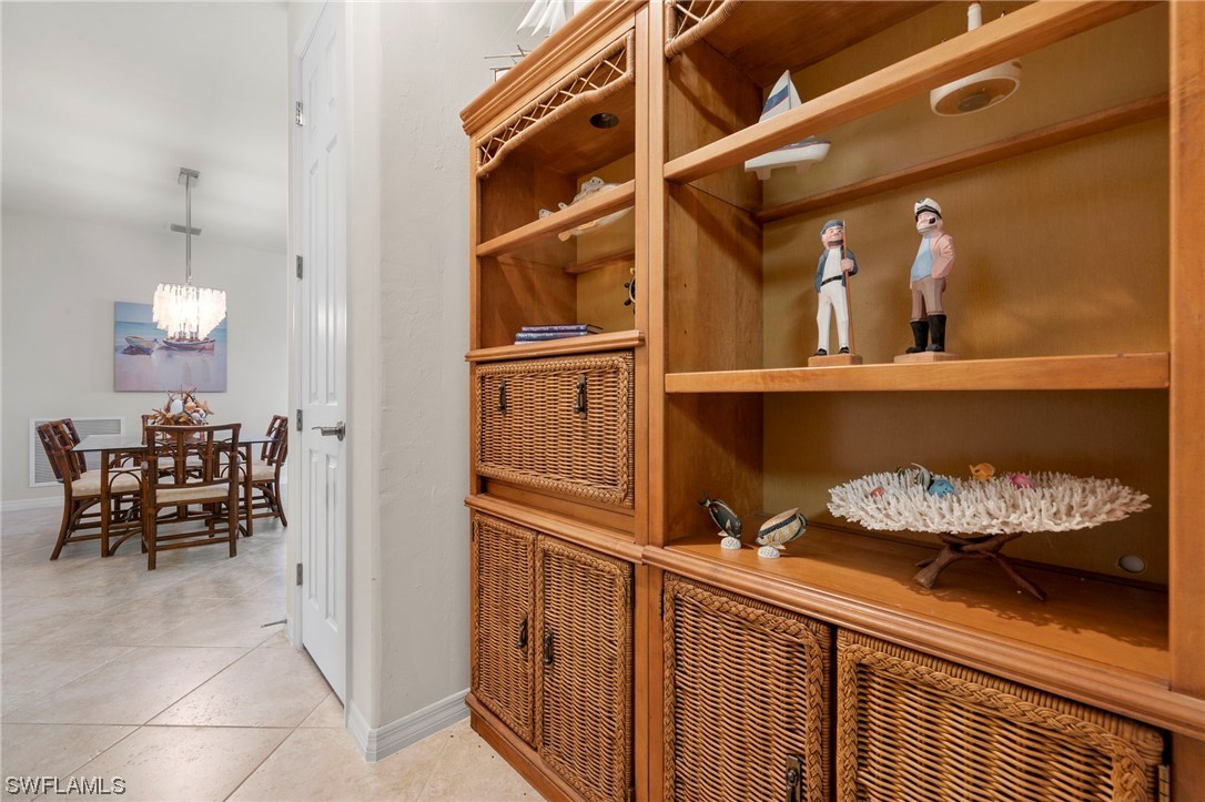 10844 Dennington Road Fort Myers, FL 33913 - Photo 21 of 50 a kitchen with a sink and chairs