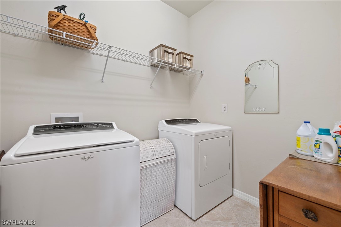 10844 Dennington Road Fort Myers, FL 33913 - Photo 22 of 50 a utility room with dryer and washer