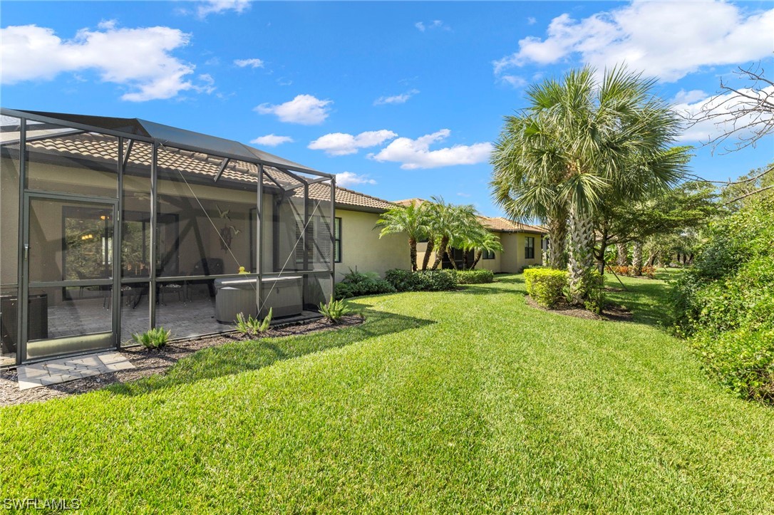 10844 Dennington Road Fort Myers, FL 33913 - Photo 28 of 50 a view of backyard with a garden and plants