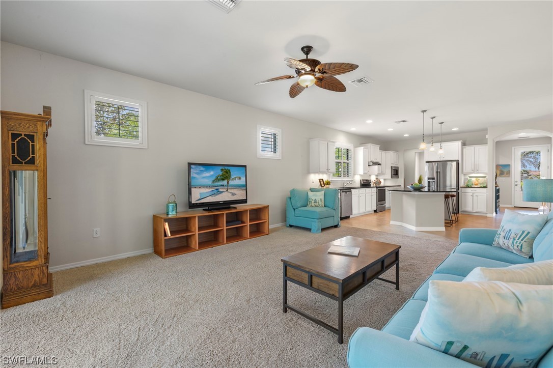 10844 Dennington Road Fort Myers, FL 33913 - Photo 3 of 50 a living room with furniture and view of kitchen