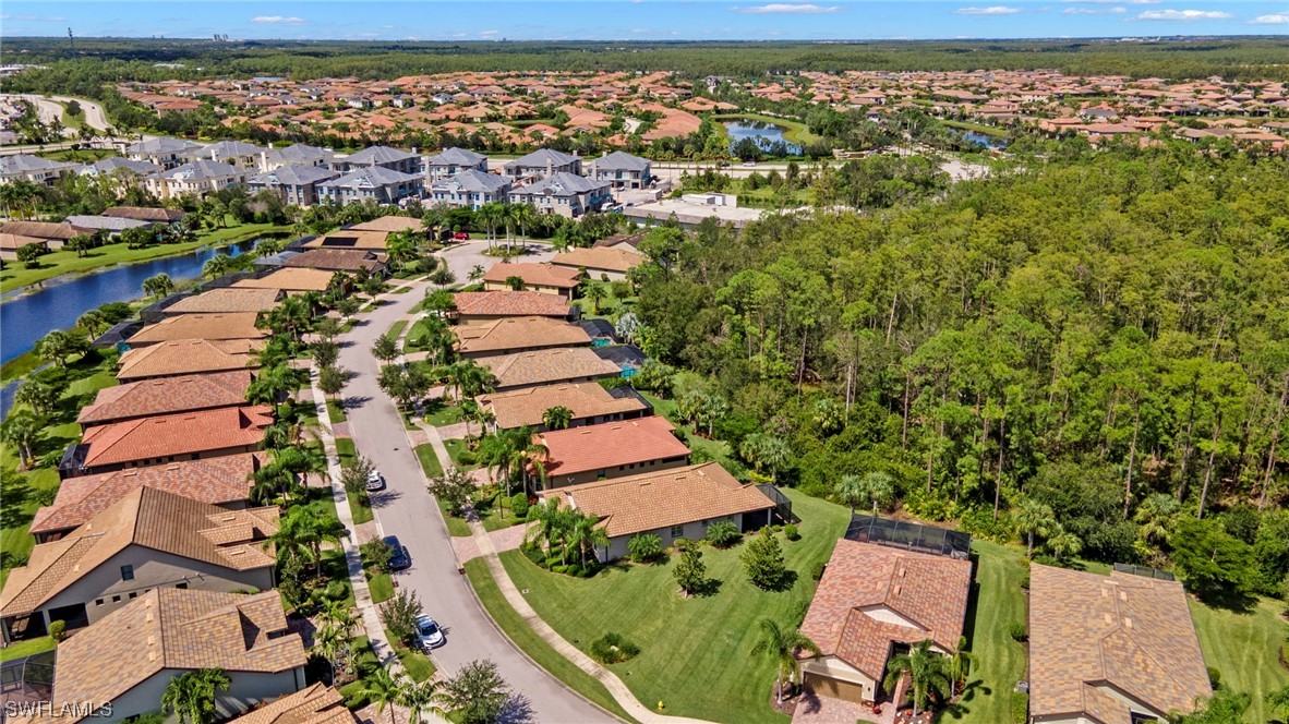 10844 Dennington Road Fort Myers, FL 33913 - Photo 34 of 50 an aerial view of residential houses with outdoor space