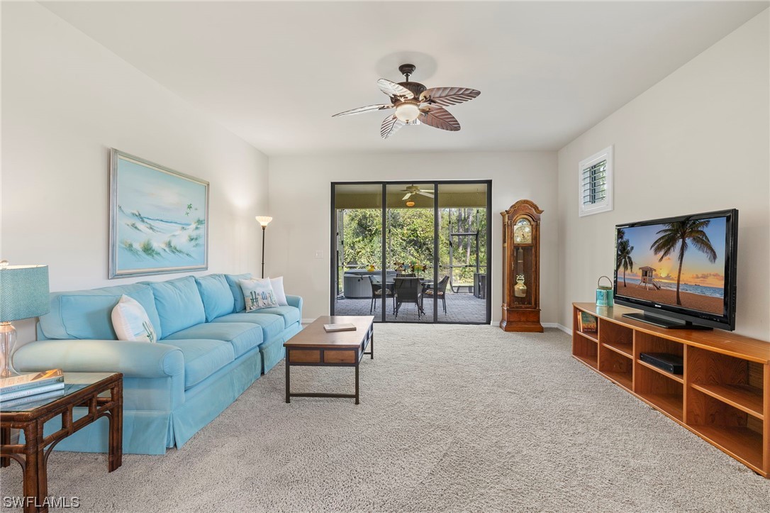 10844 Dennington Road Fort Myers, FL 33913 - Photo 8 of 50 a living room with furniture and a flat screen tv