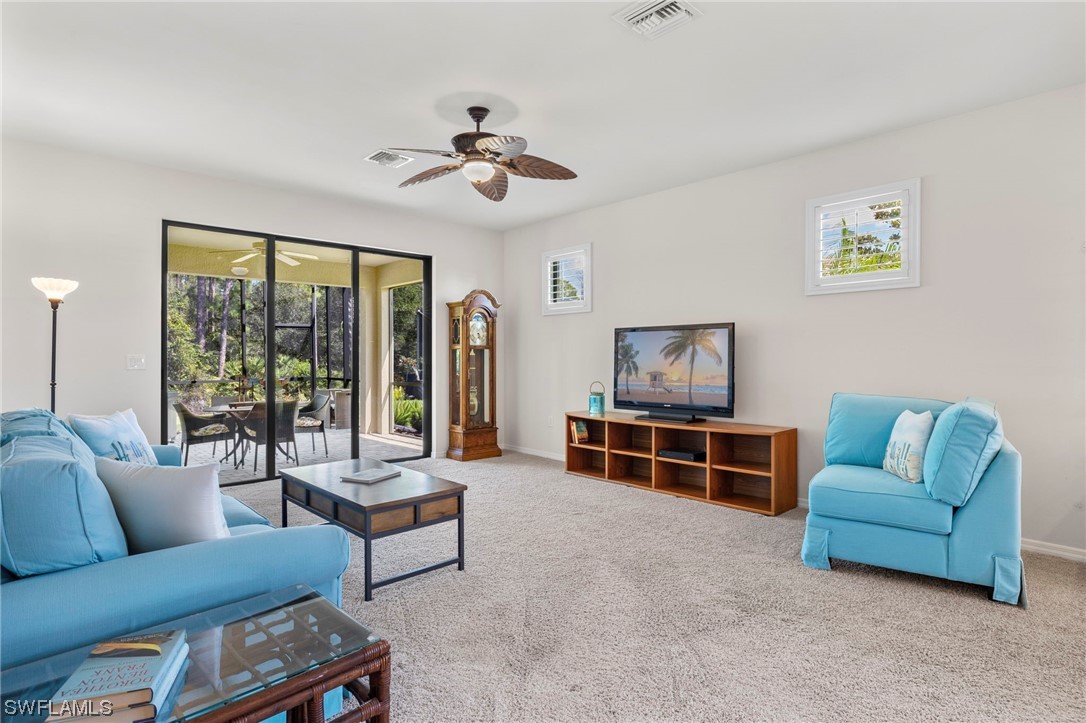 10844 Dennington Road Fort Myers, FL 33913 - Photo 9 of 50 a living room with furniture and a window