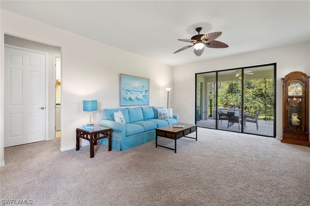 10844 Dennington Road Fort Myers, FL 33913 - Photo 10 of 50 a living room with furniture and a large window