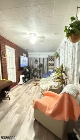 a view of living room with furniture and a couch