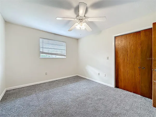 a view of a livingroom with a staircase