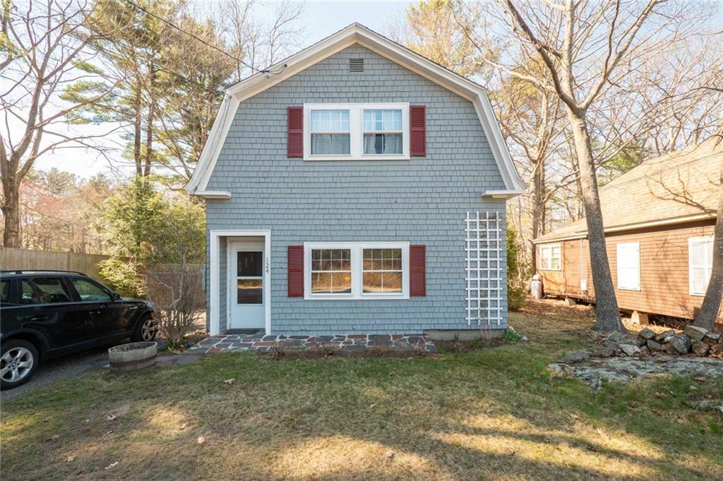 124 Shore Road York, ME 03902 - Photo 2 of 34 The shingled siding lends to the...