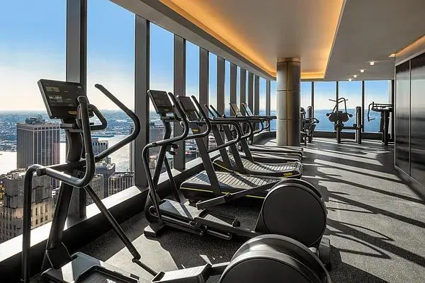 a view of gym equipment and windows