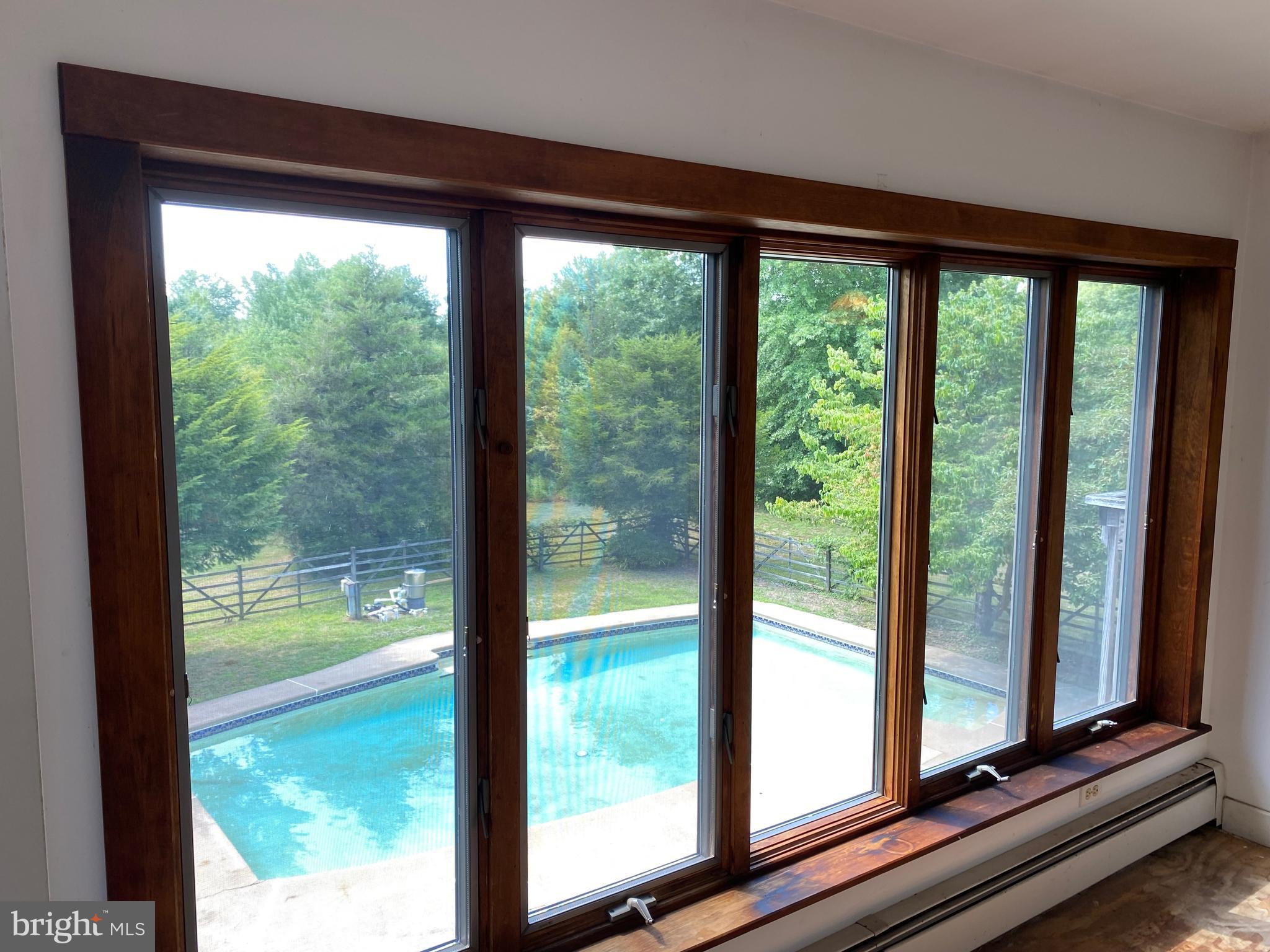 412 Center School Road Perkasie, PA 18944 - Photo 20 of 32 Master Bedroom window overlooking Pool