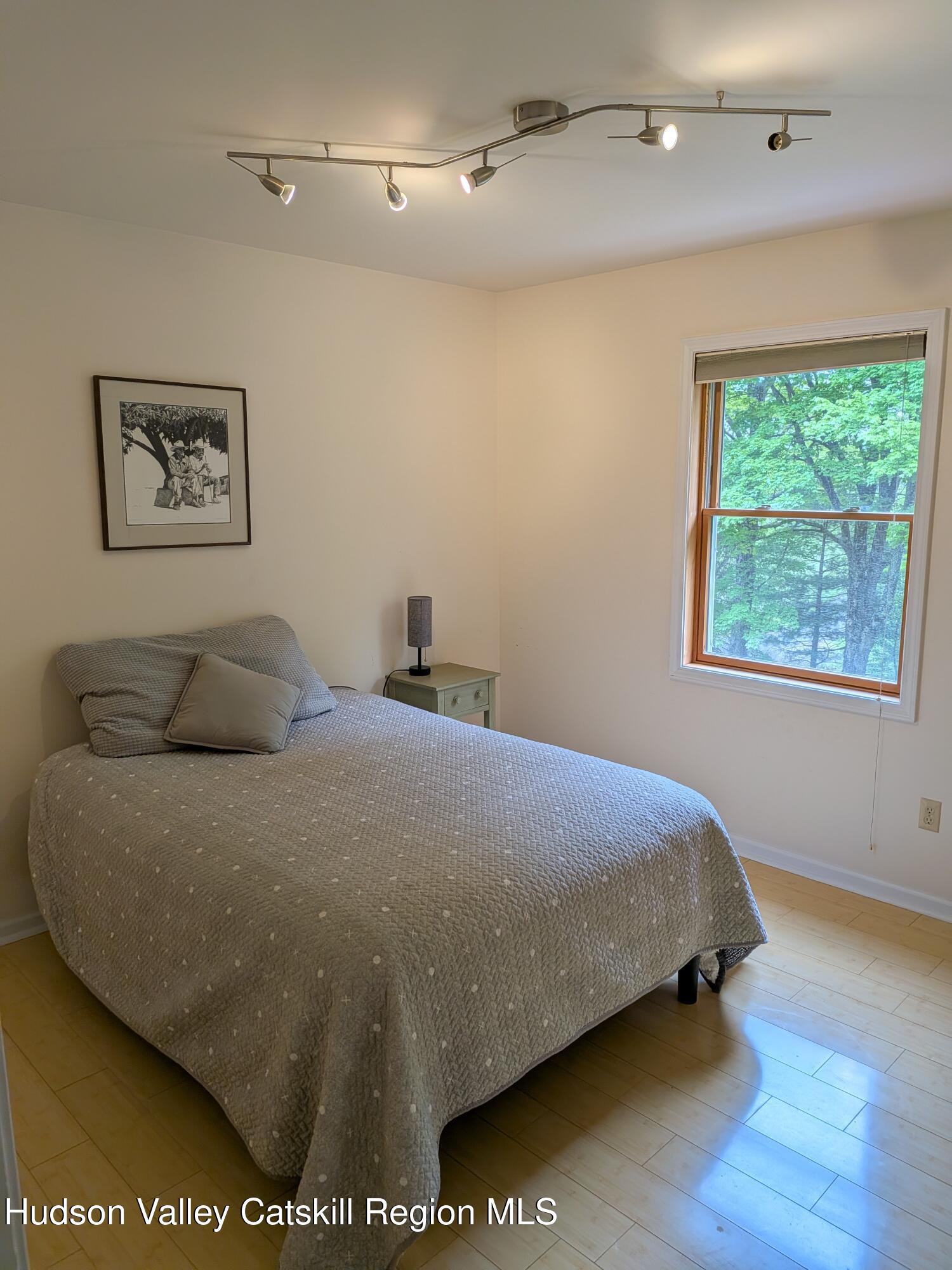 513 South Mountain Road Gardiner, NY 12525 - Photo 16 of 63 a bedroom with a bed and a window