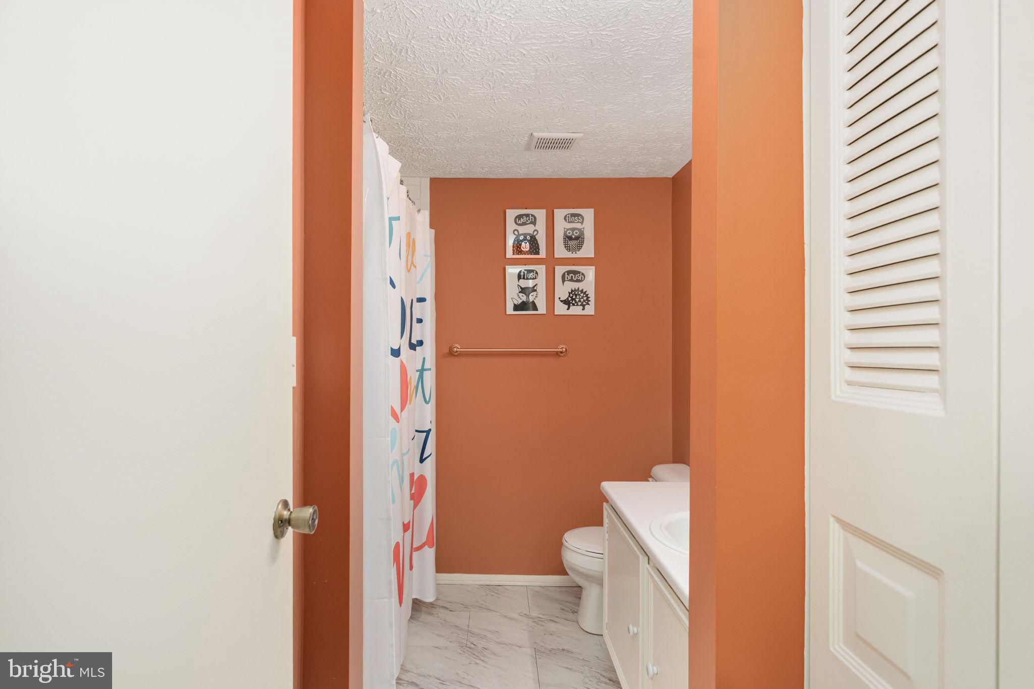 11537 Ivy Bush Court Reston, VA 20191 - Photo 31 of 49 a bathroom with a toilet