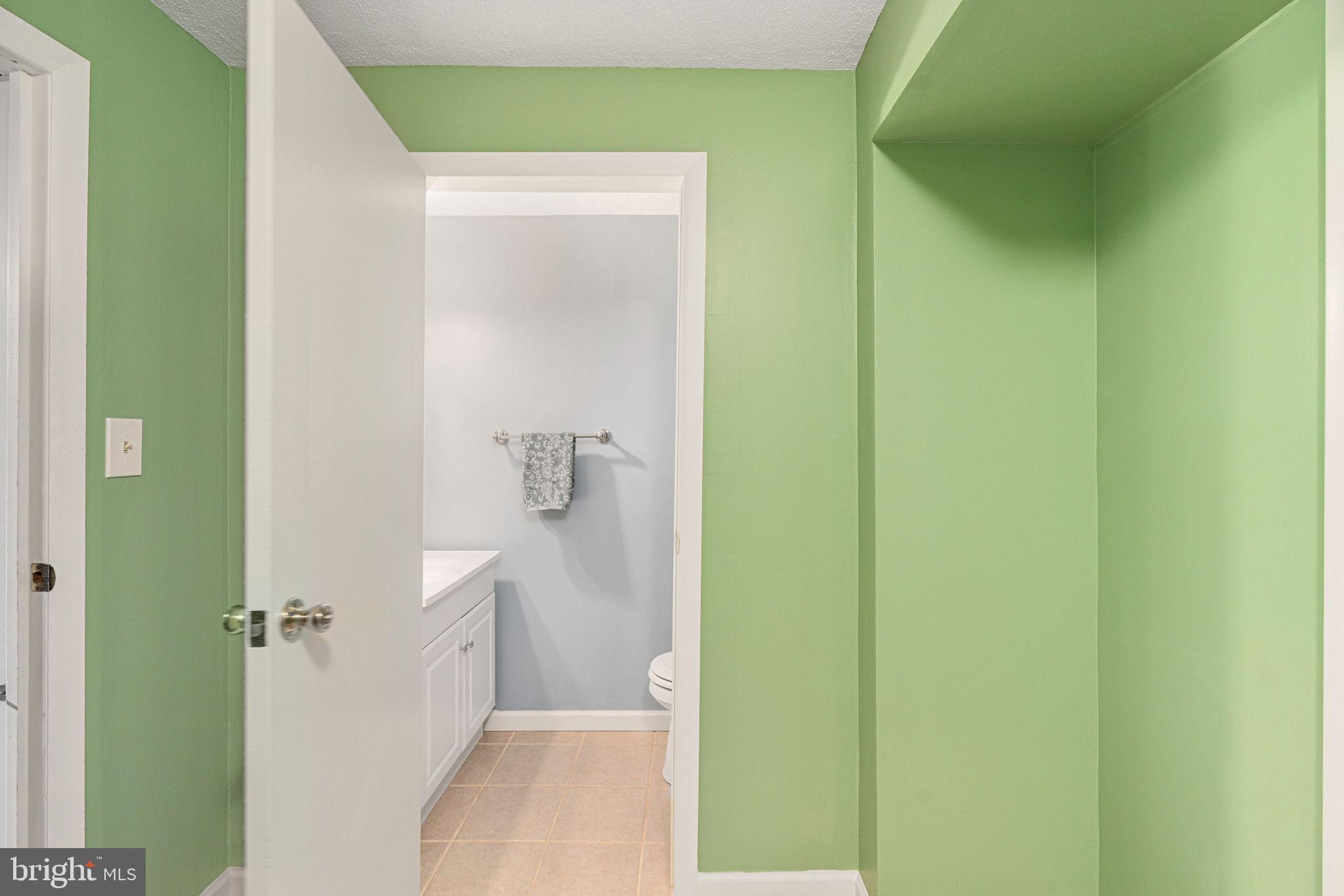 11537 Ivy Bush Court Reston, VA 20191 - Photo 36 of 49 a bathroom with a shower and a toilet