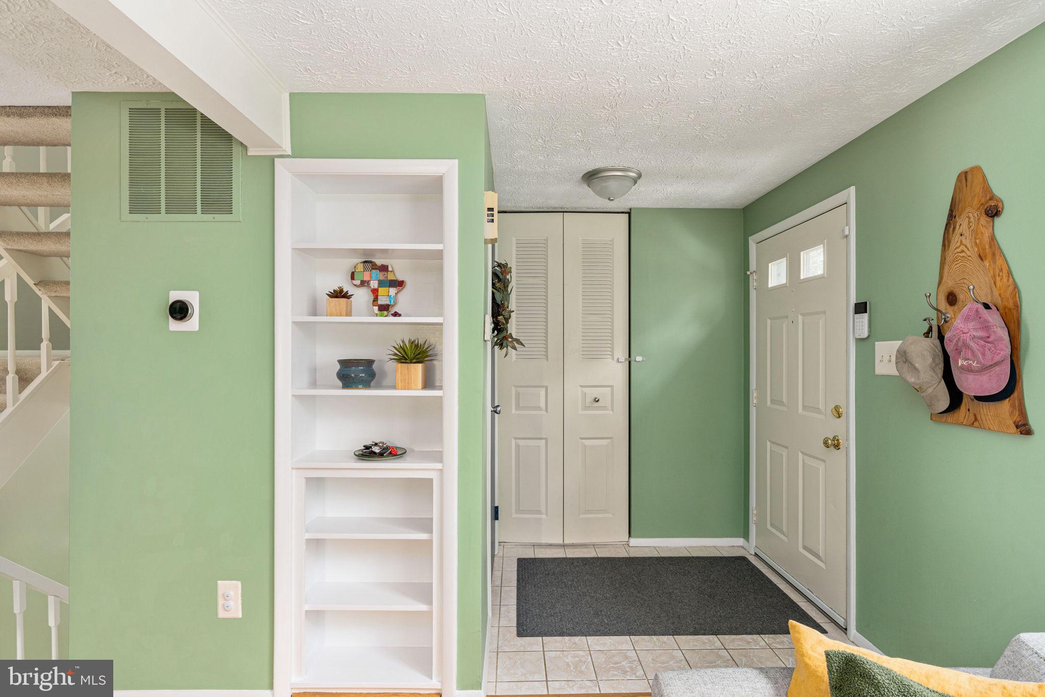 11537 Ivy Bush Court Reston, VA 20191 - Photo 6 of 49 a view of a hallway with closet and window