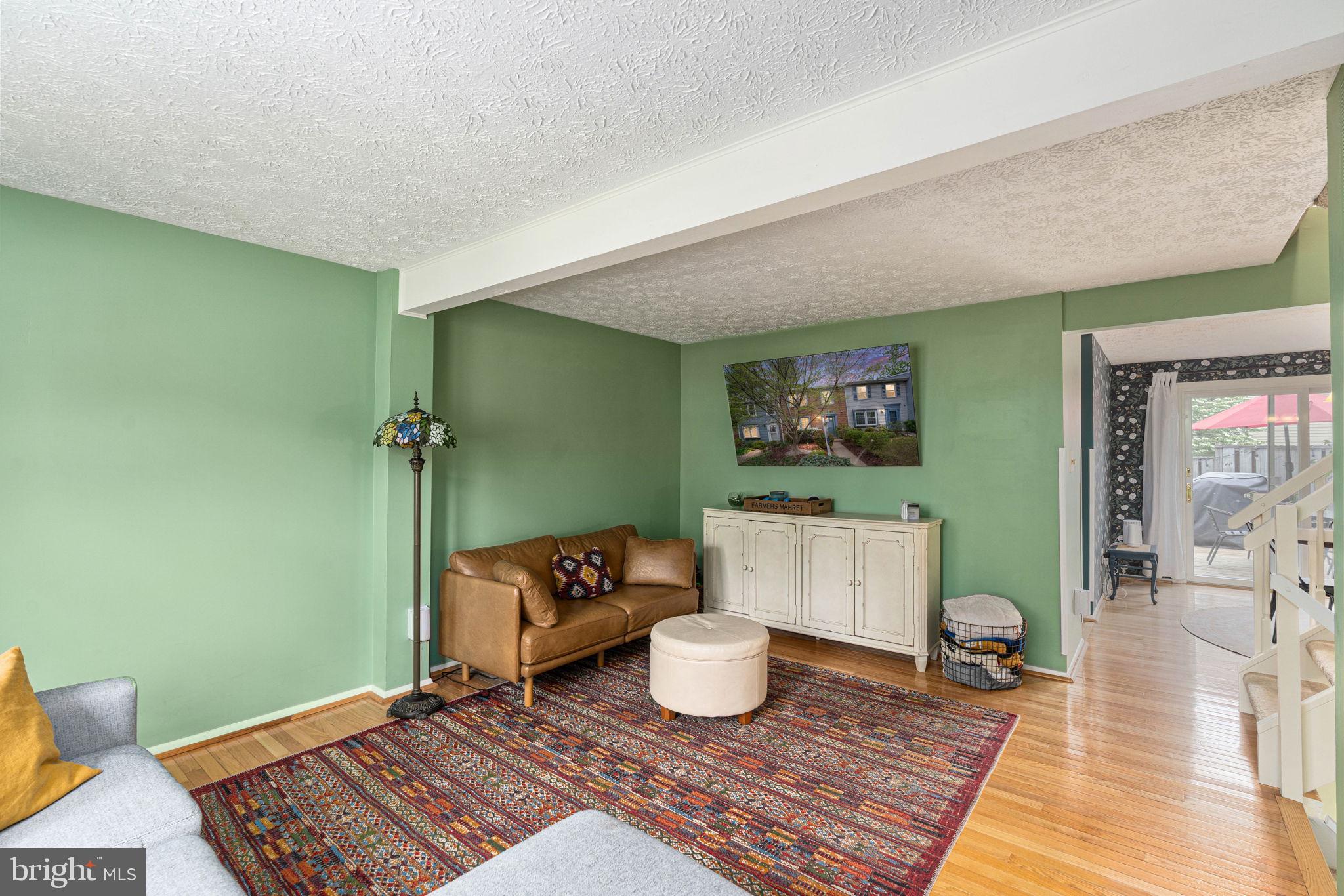 11537 Ivy Bush Court Reston, VA 20191 - Photo 7 of 49 a living room with furniture and a rug