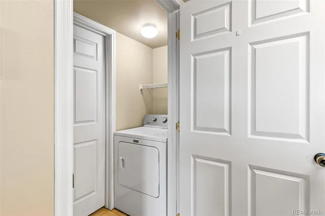 a bedroom with bed and a window