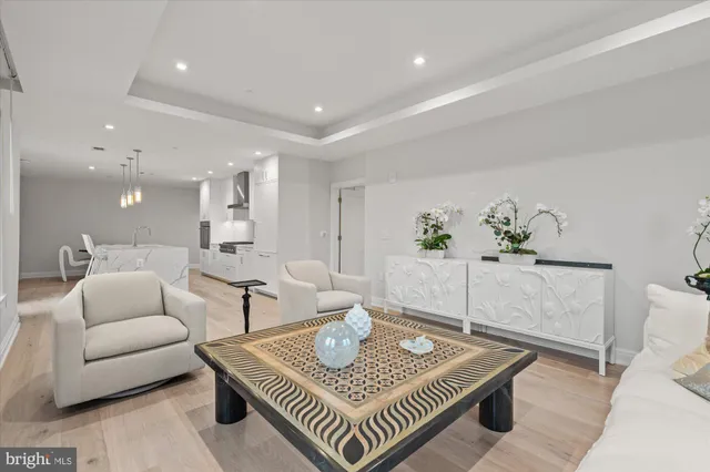 a living room with furniture and window
