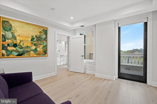 a view of workspace with furniture and window