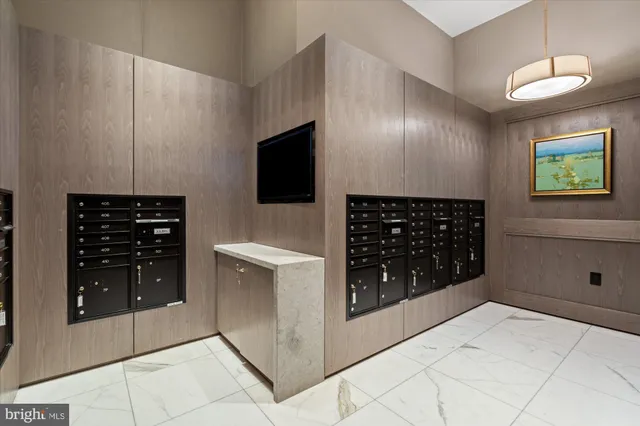 a lobby with furniture and outdoor views