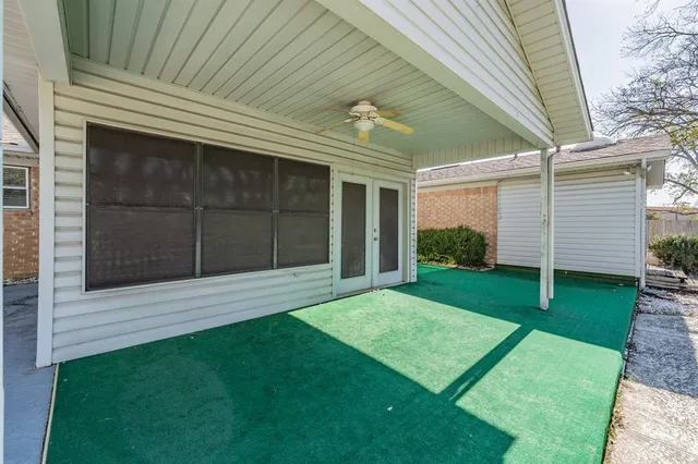 a view of a backyard with a garden