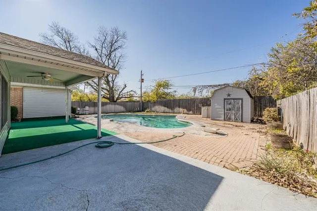 a house with yard and entertaining space