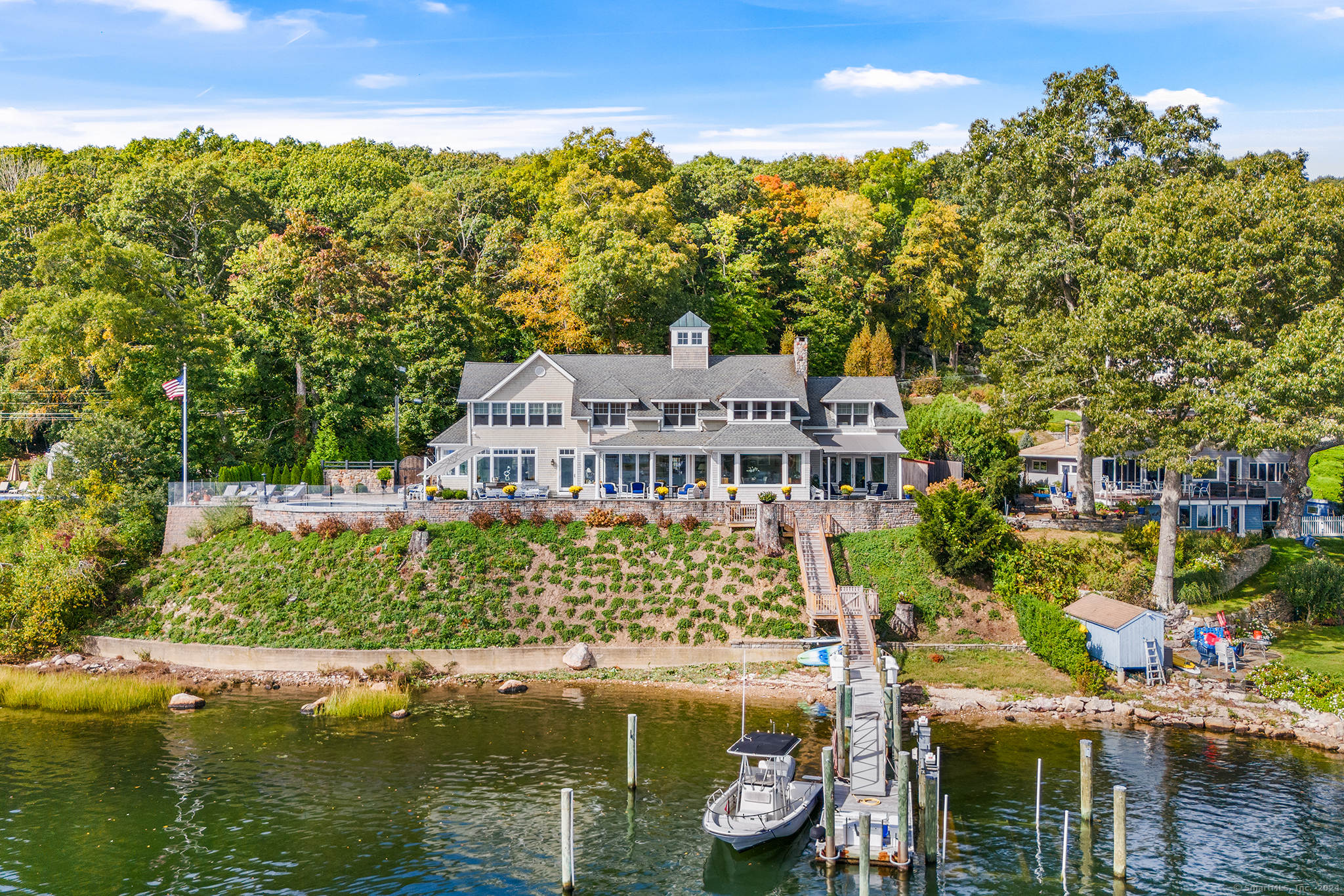 a view of a lake with a house in the background