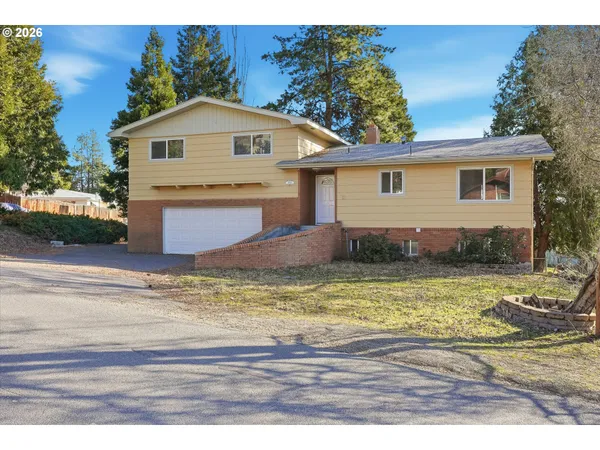 a view of a house with a swimming pool