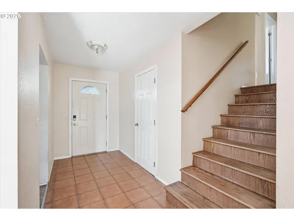 a view of entryway with stairs