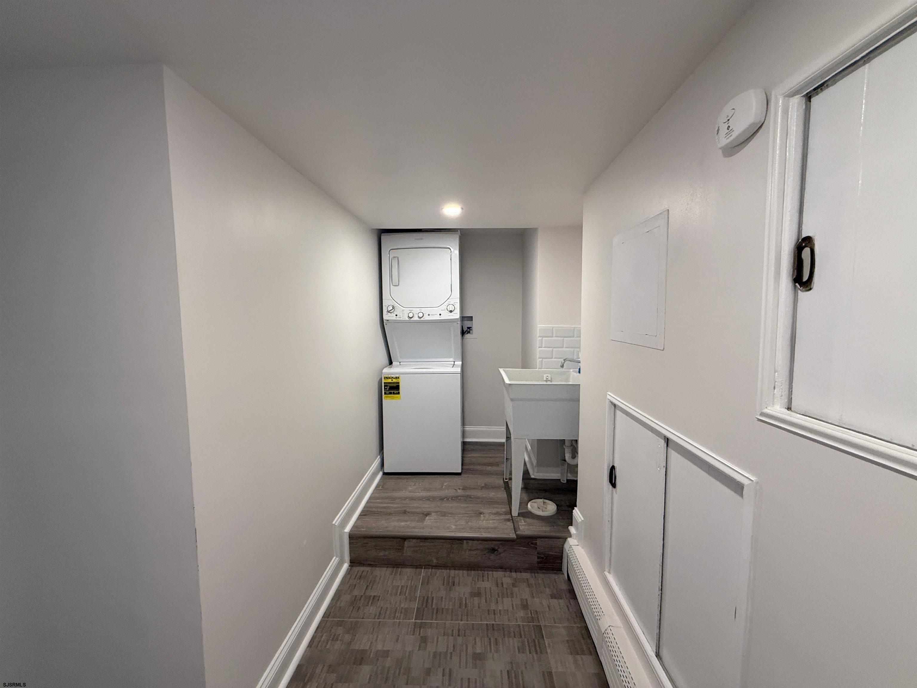 102 South Raleigh Avenue, Unit B Atlantic City, NJ 08401 - Photo 17 of 18 a view of a hallway with an empty room