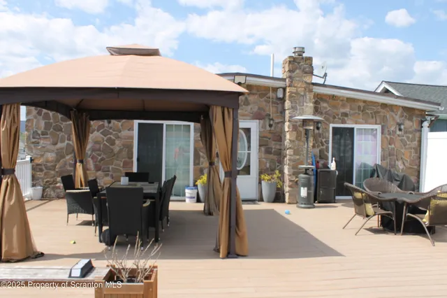 a view of a living room and kitchen