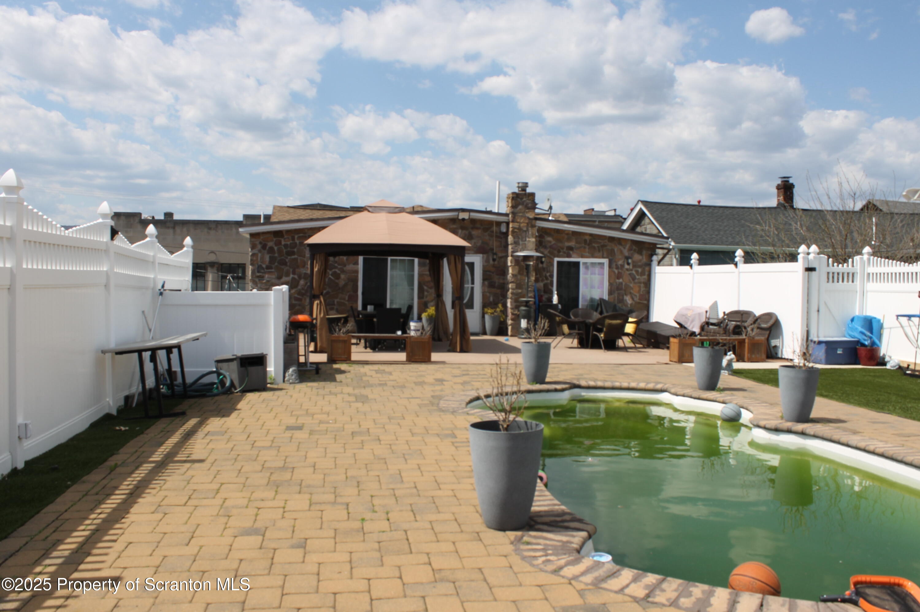 527 Cedar Avenue, Unit 3 Scranton, PA 18505 - Photo 5 of 7 a view of a swimming pool with a patio