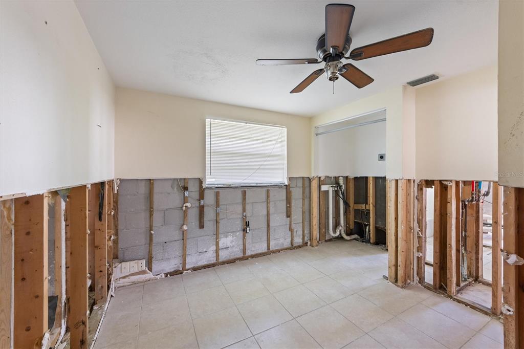 411 Alamanda Road Anna Maria, FL 34216 - Photo 14 of 41 a view of a livingroom with a staircase