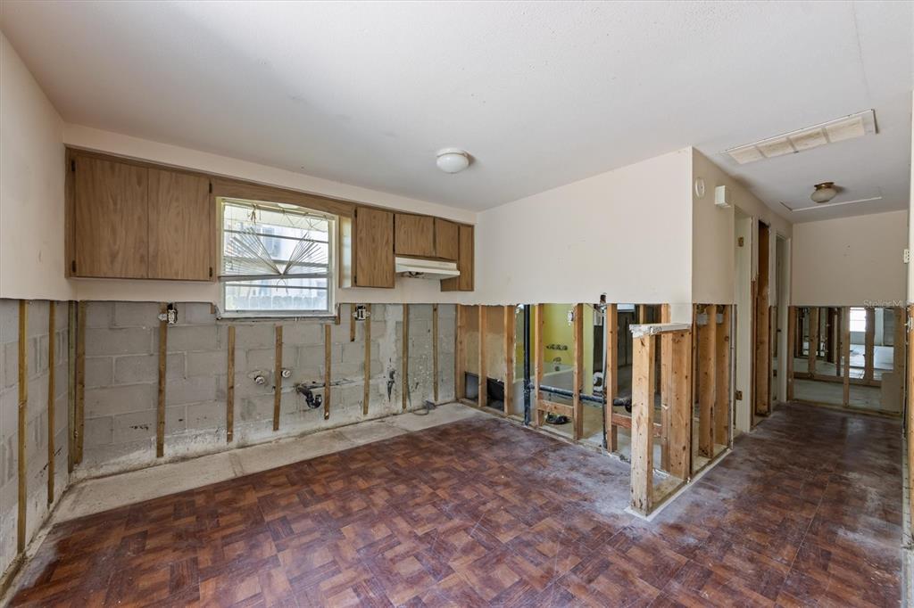 411 Alamanda Road Anna Maria, FL 34216 - Photo 16 of 41 a view of entryway with wooden floor