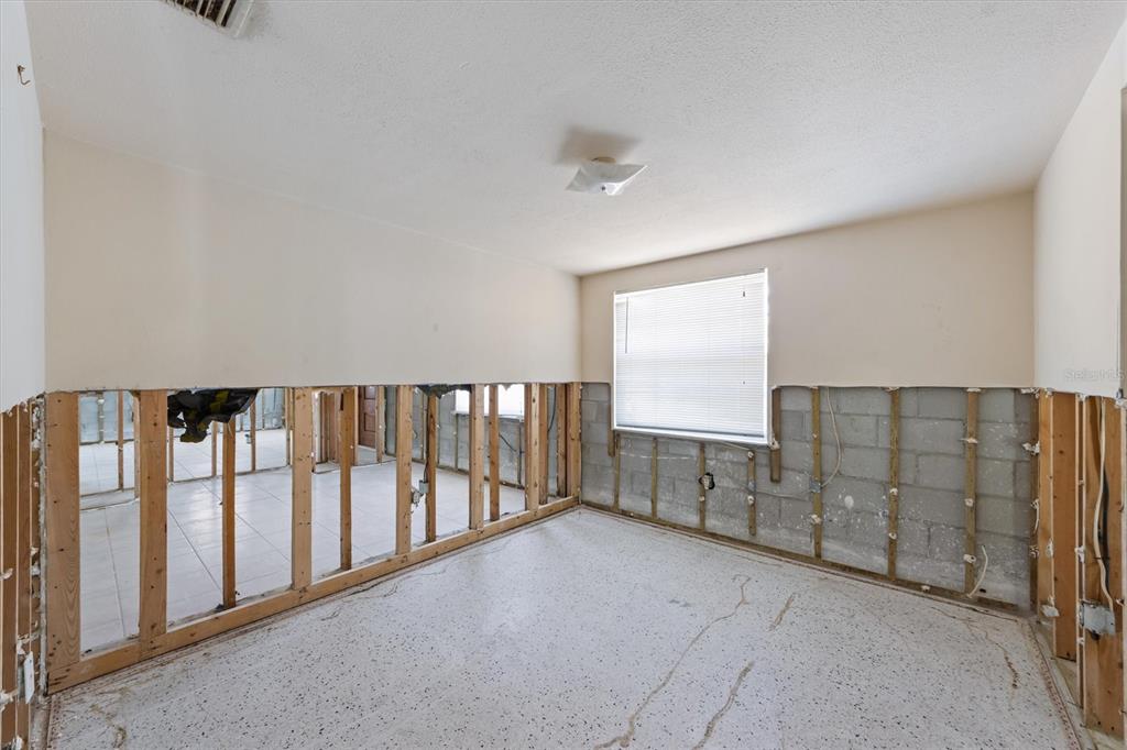 411 Alamanda Road Anna Maria, FL 34216 - Photo 19 of 41 a view of a hallway with entryway