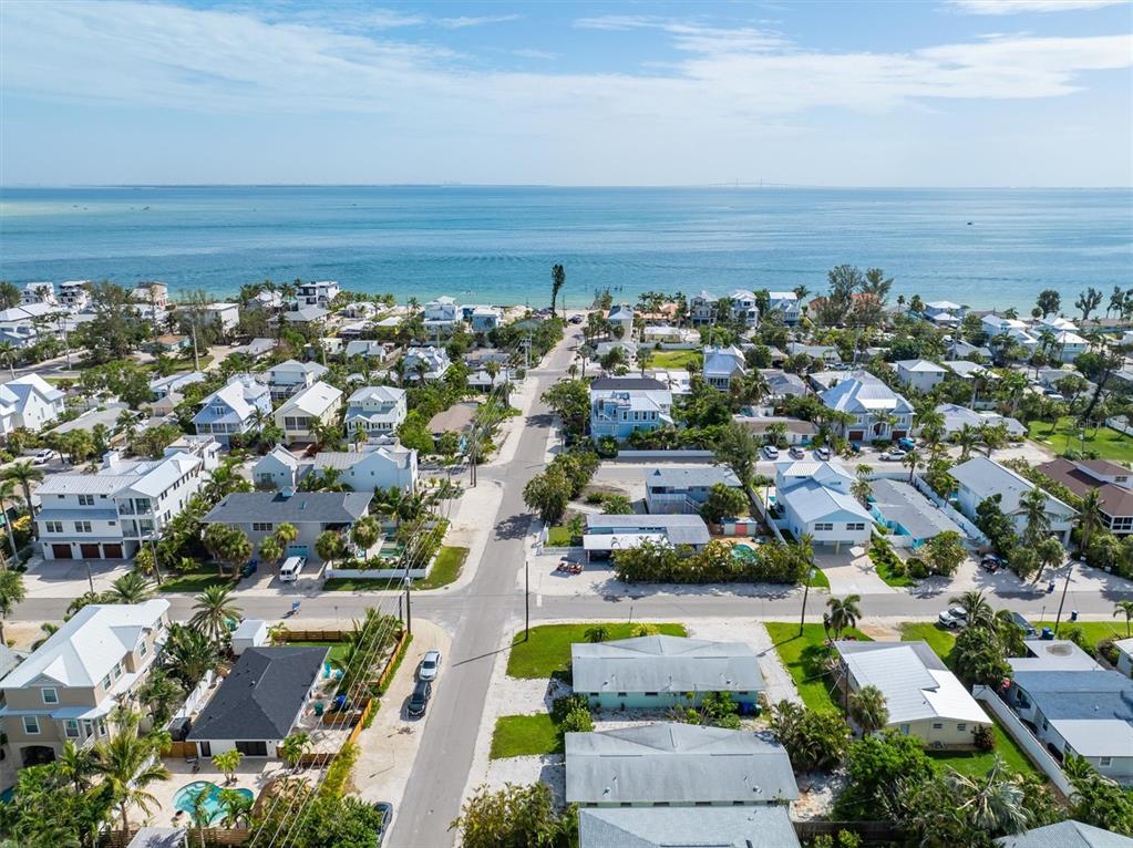 411 Alamanda Road Anna Maria, FL 34216 - Photo 35 of 41 an aerial view of residential houses with outdoor space